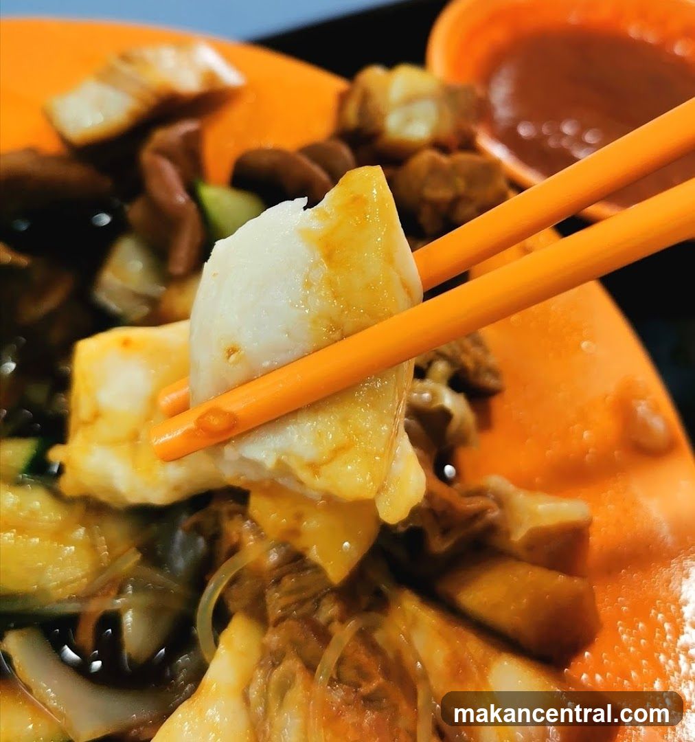 Close-up of a dish with chopsticks