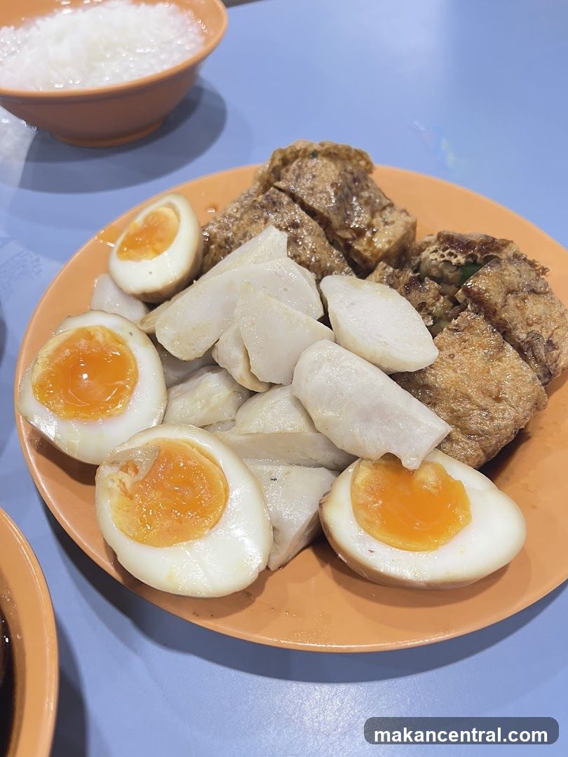 Plate of Food with Eggs and Fish Cakes
