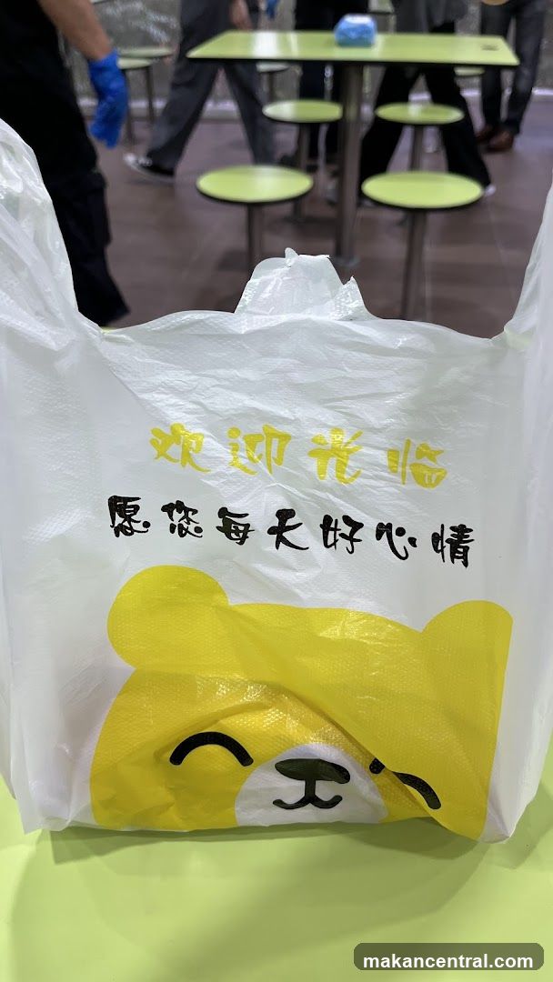 Plastic bag with cartoon bear and text