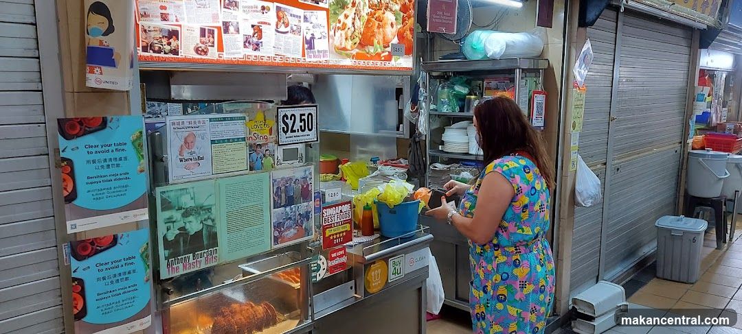 Food Stall with Various Advertisements
