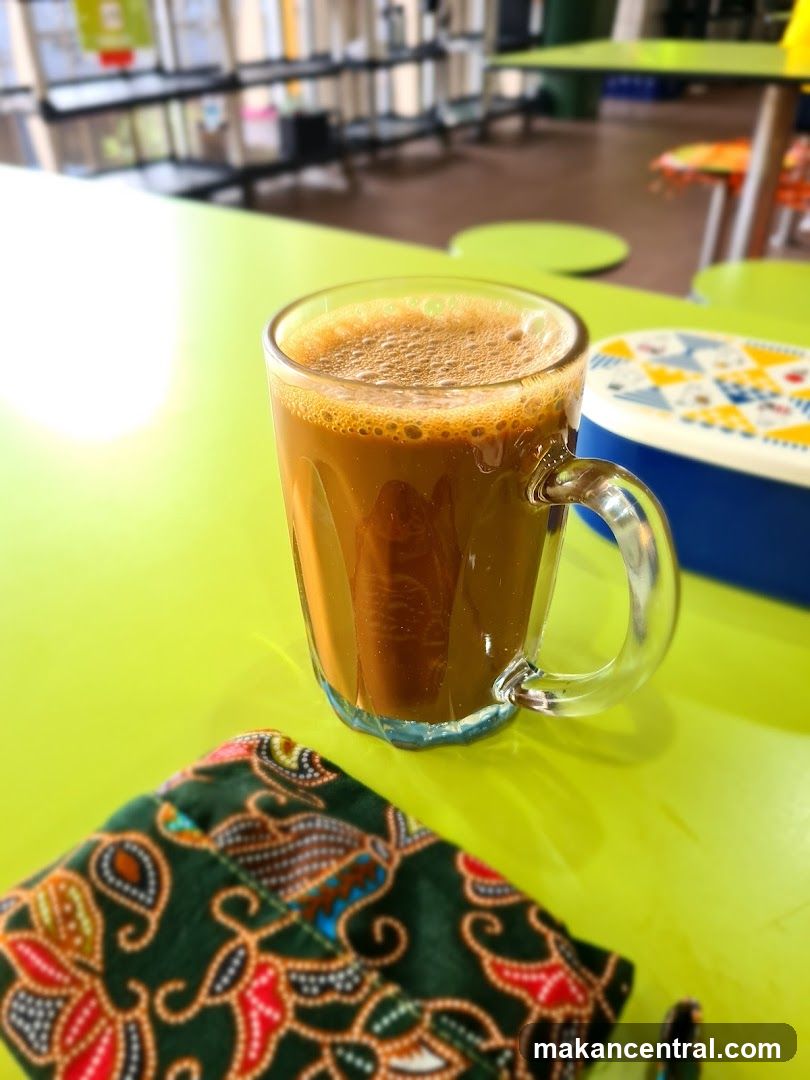 Coffee and Lunchbox on Table