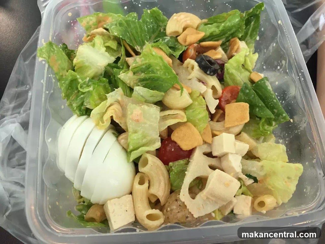 Salad in a plastic container