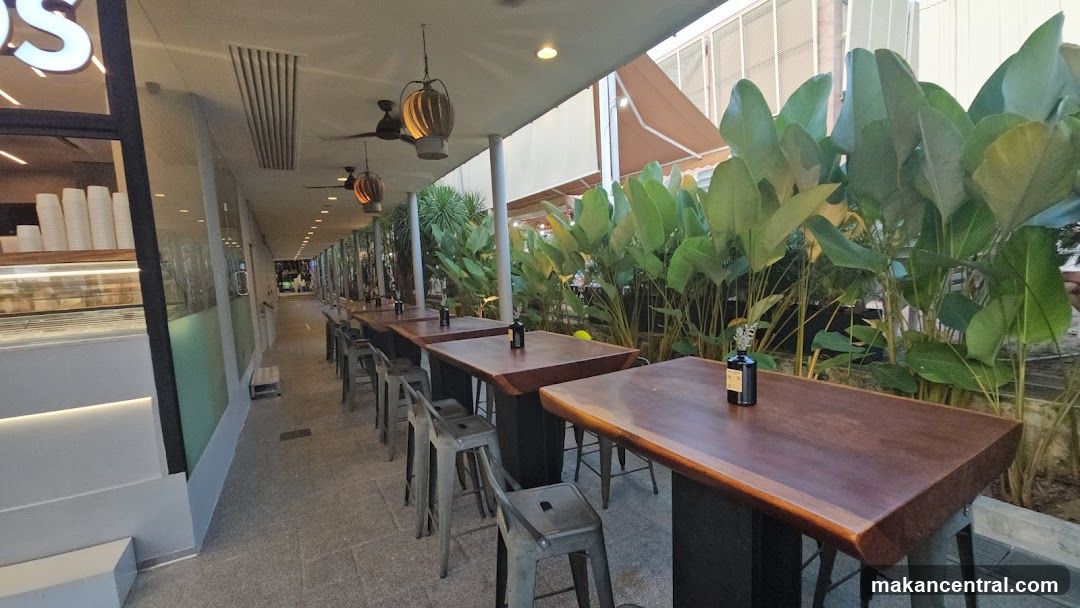 Outdoor Seating Area with Lush Greenery