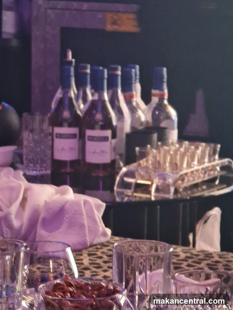 Bar Setup with Bottles and Glasses