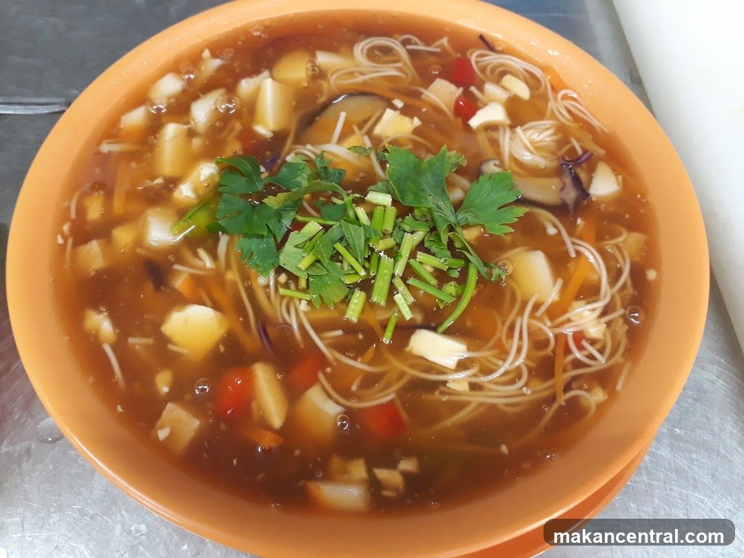 Bowl of Noodles with Tofu and Vegetables