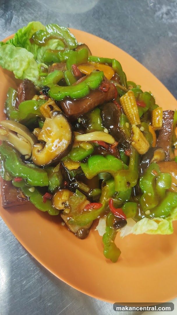 Stir-fried Bitter Melon with Mushrooms and Baby Corn