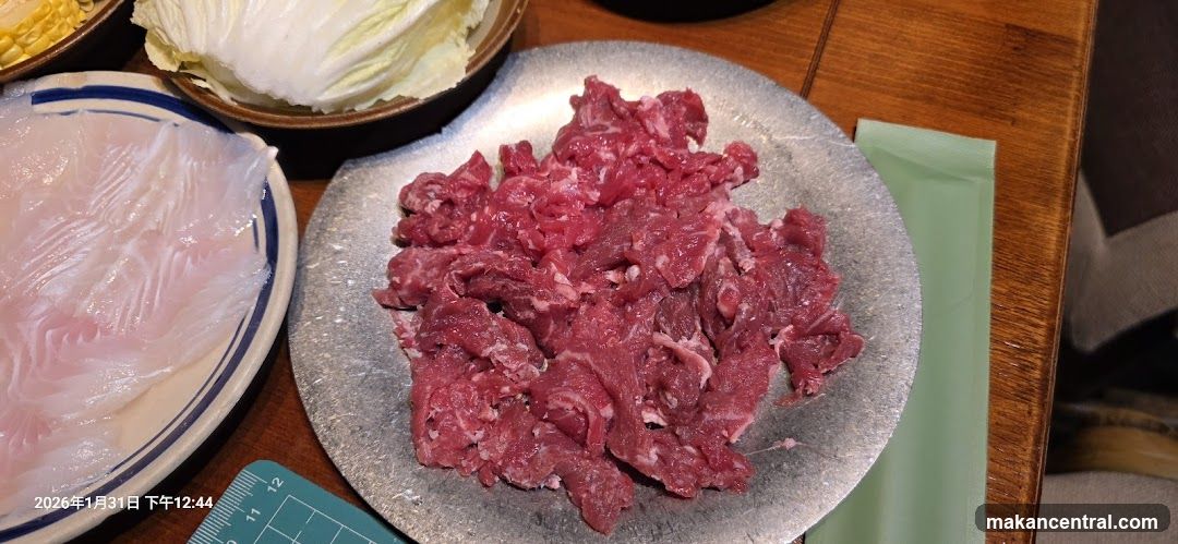 Thinly Sliced Raw Beef and Fish