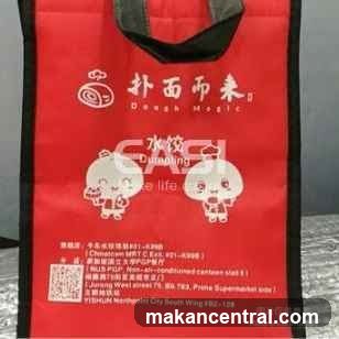 Red Tote Bag with Chinese Text and Cartoons