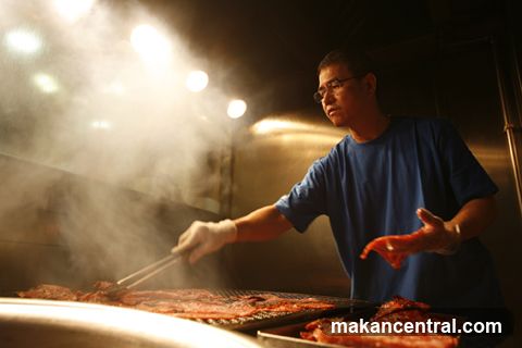 Man grilling meat