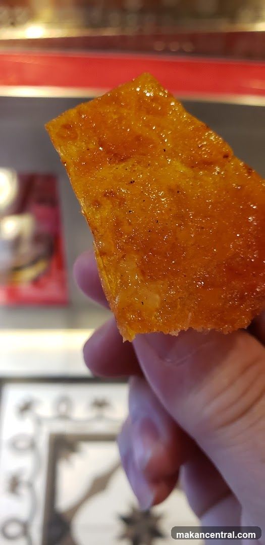 Close-up of a crispy, glazed food item