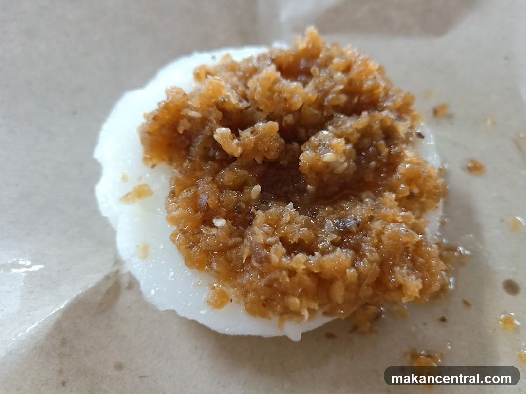 Sweet Coconut Topping on White Cake
