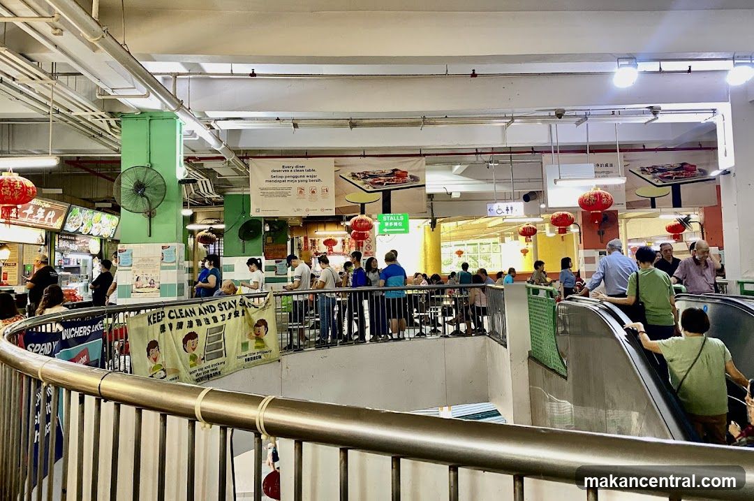 Busy Food Court with Escalator