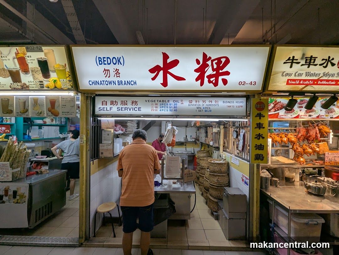 Food Stall with Drinks and Roasted Meats