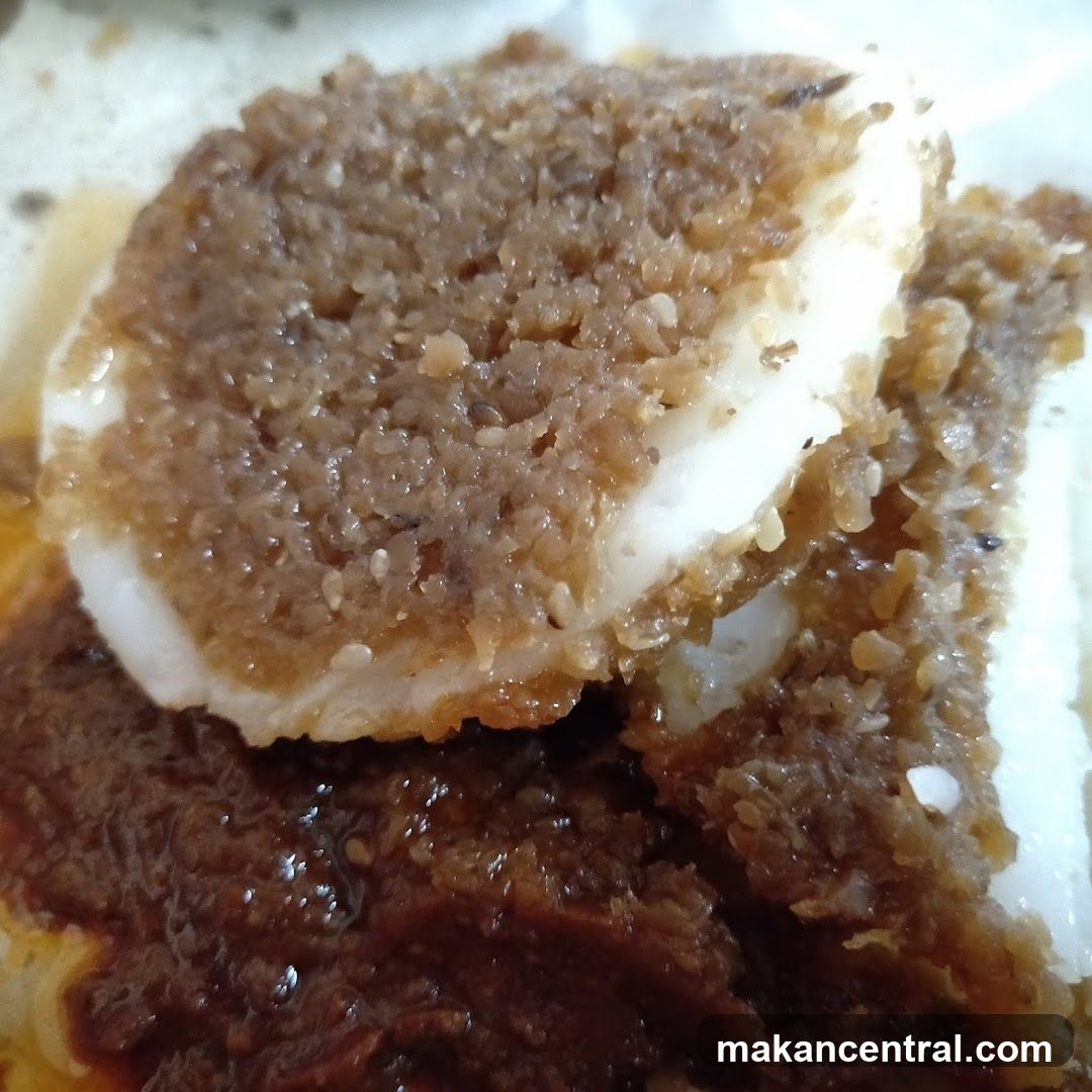 Close-up of a dessert with white filling and brown topping