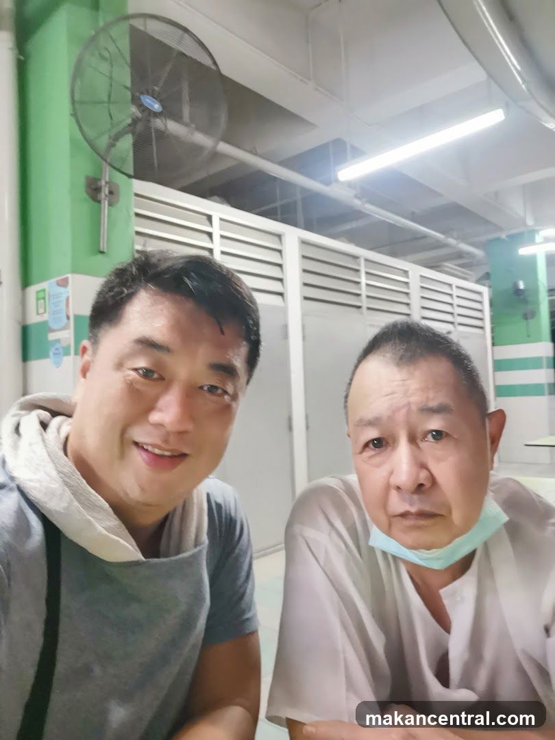 Two Men Posing for a Selfie