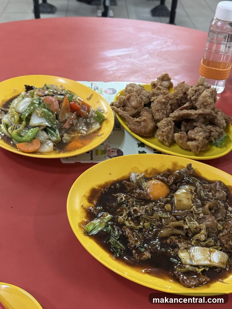 Three Plates of Food on a Red Table