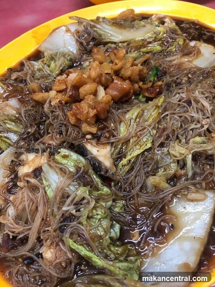 Braised Noodles with Cabbage and Crispy Pork