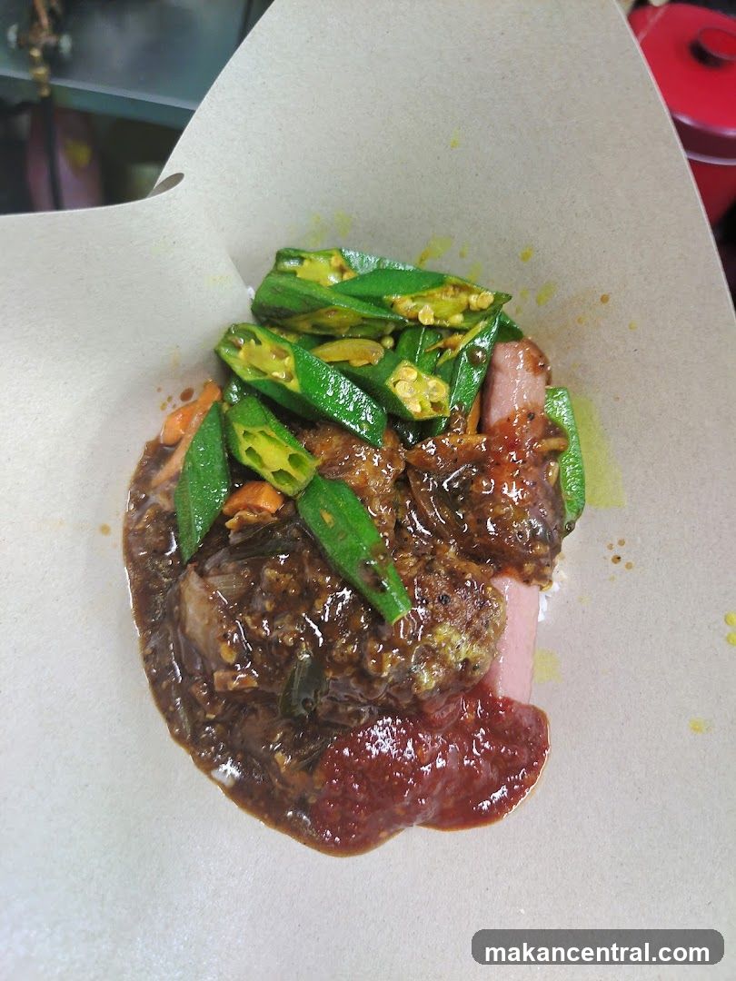 Food dish with okra and sauce