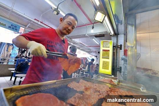Man grilling meat