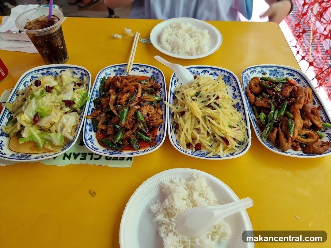 Four dishes of food and rice