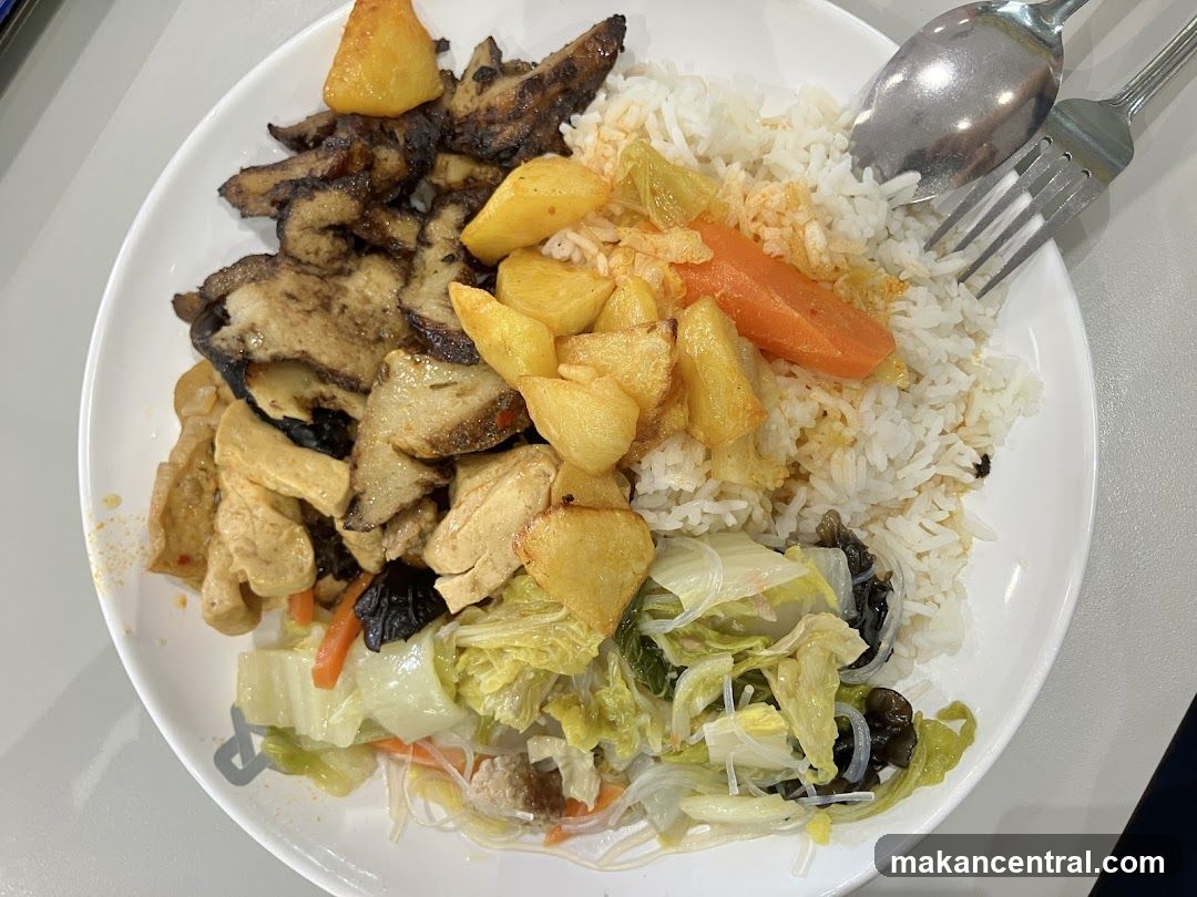 Plate of Rice with Various Toppings