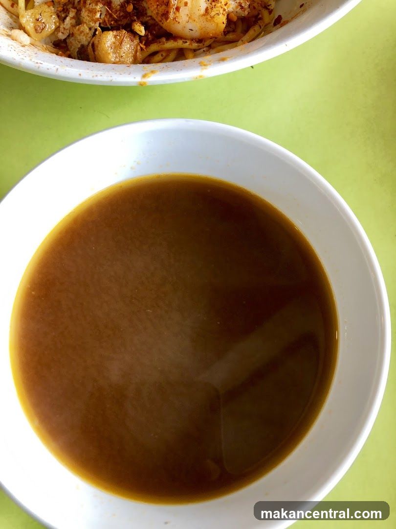Bowl of Broth and Noodles
