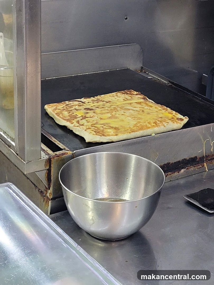 Roti Canai Cooking