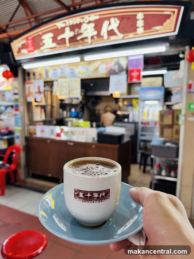 Coffee cup in front of a shop