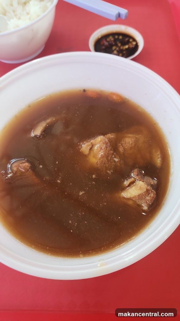 Bowl of Soup with Rice and Dipping Sauce