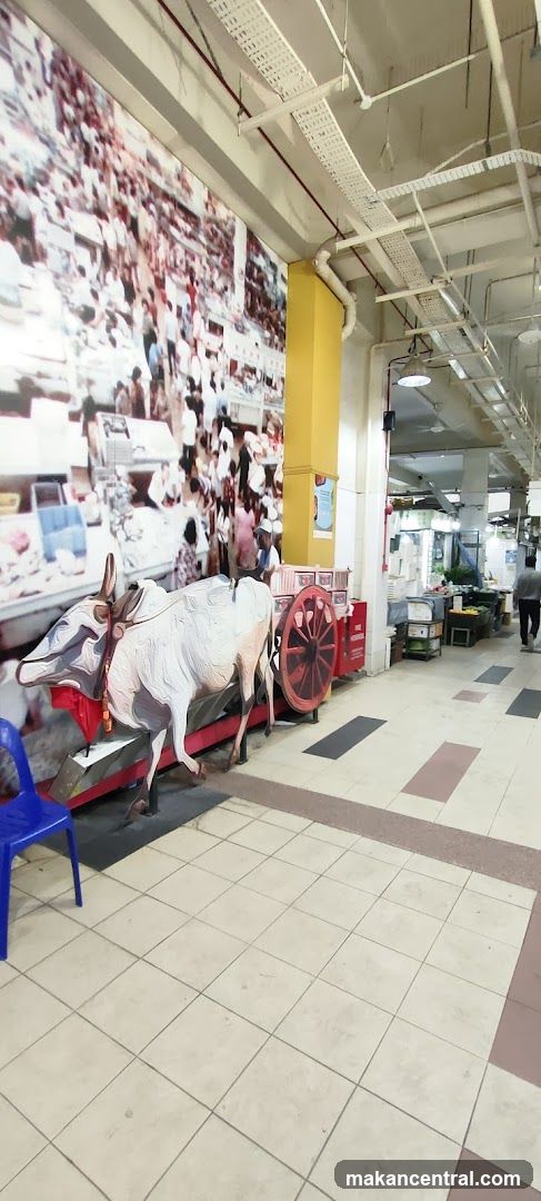 Marketplace Scene with Bull Cart Display
