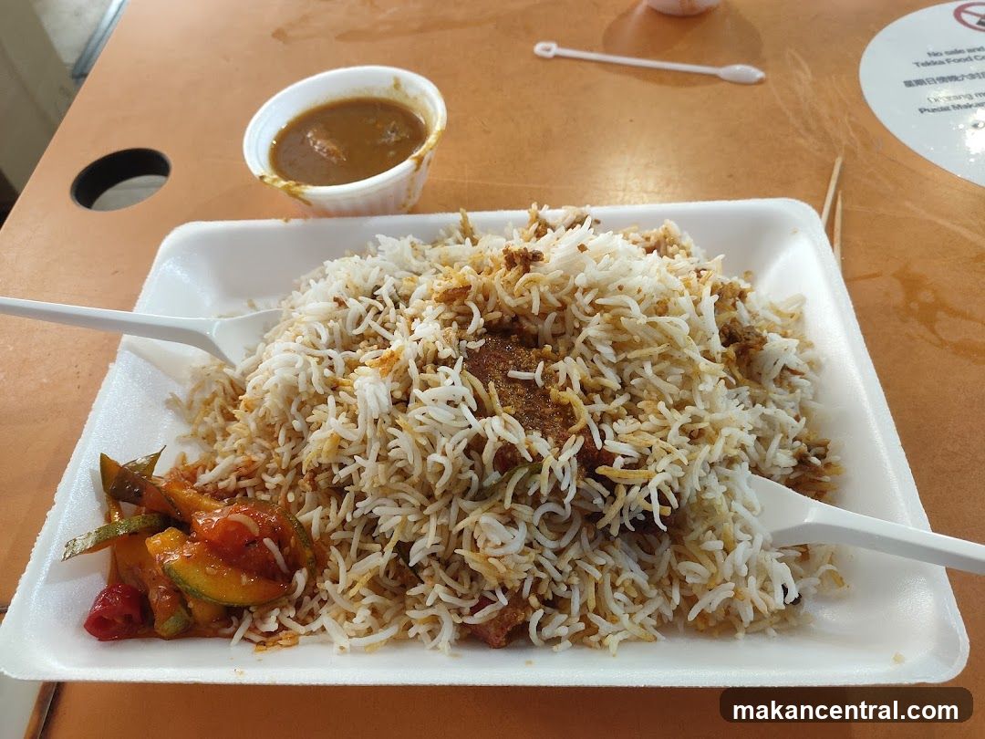 Biryani with Curry and Pickles