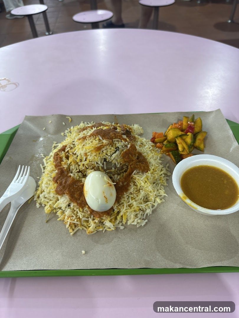 Biryani with Egg and Side Salad