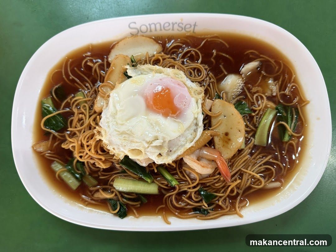 Noodles with Fried Egg and Seafood