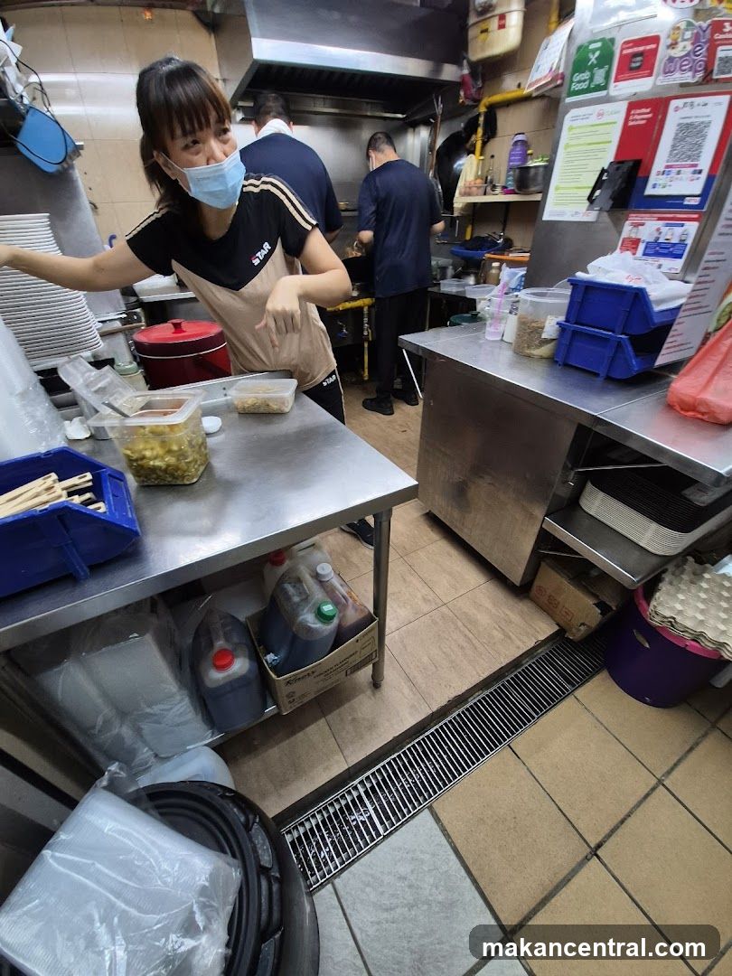 Kitchen Staff Preparing Food