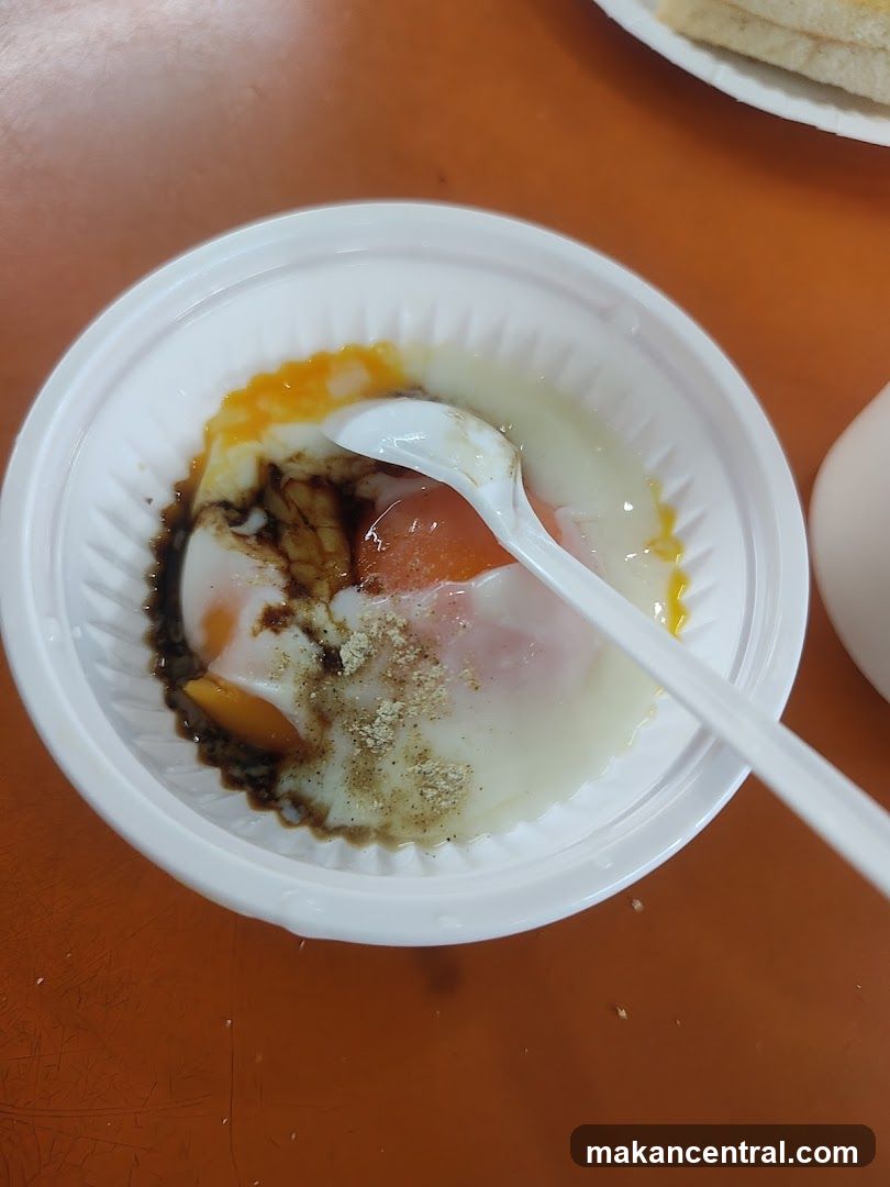 Soft-boiled eggs with soy sauce and pepper