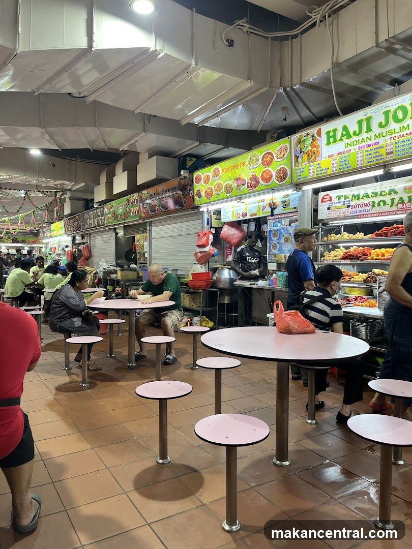 Food court with dining tables and stalls