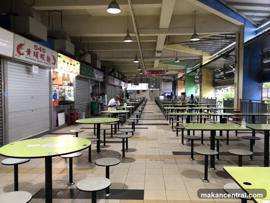 Food court with many tables and stalls
