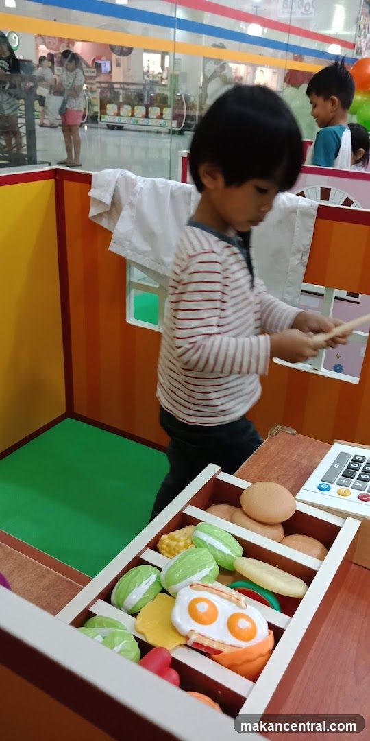 Children playing with toy food