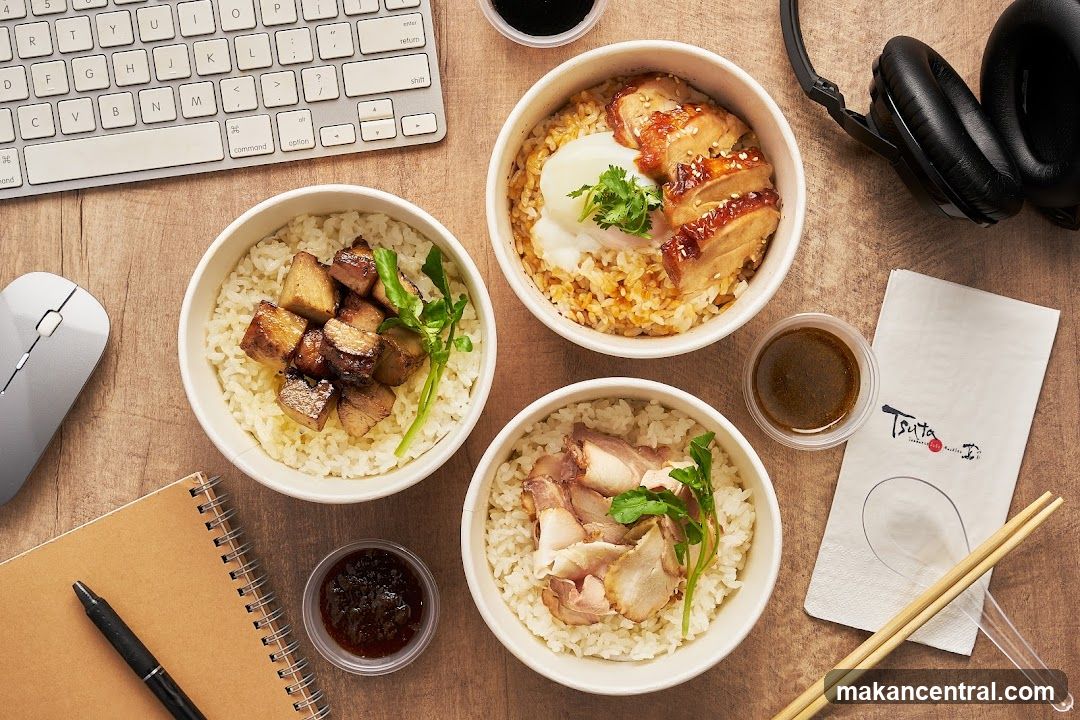 Three bowls of rice with meat toppings