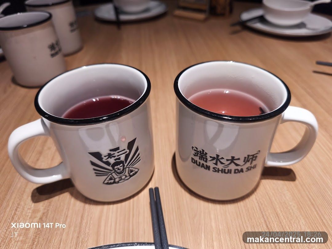 Two Mugs of Drink