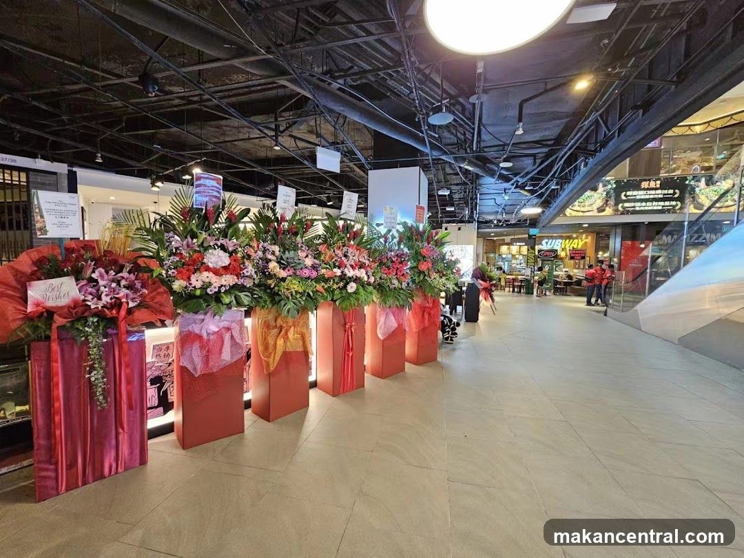 Mall Interior with Floral Arrangements and Food Outlets