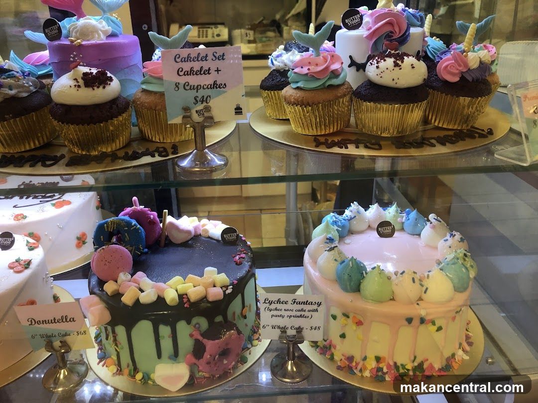 Assortment of Decorated Cakes and Cupcakes