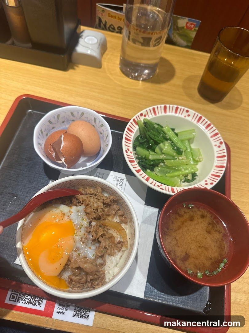 Beef bowl with egg and side dishes