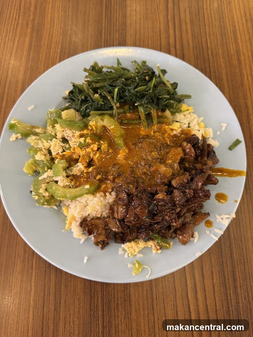 Plate of Rice with Various Toppings