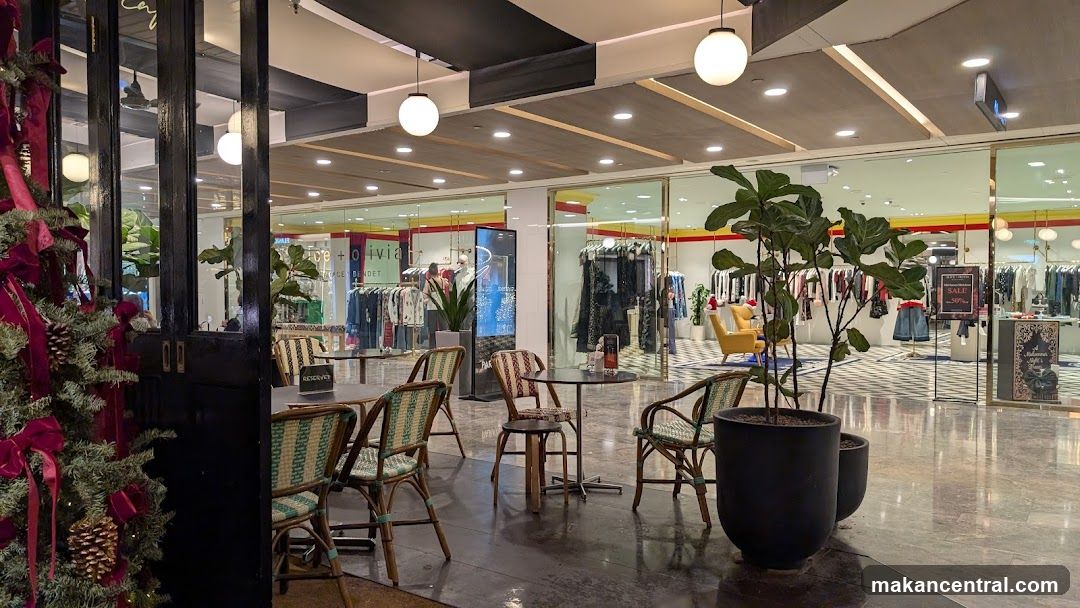 Clothing Store Interior with Seating Area