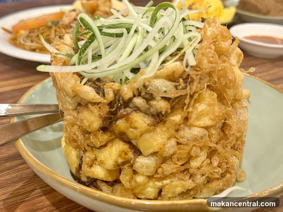 Fried Dish with Cucumber Garnish