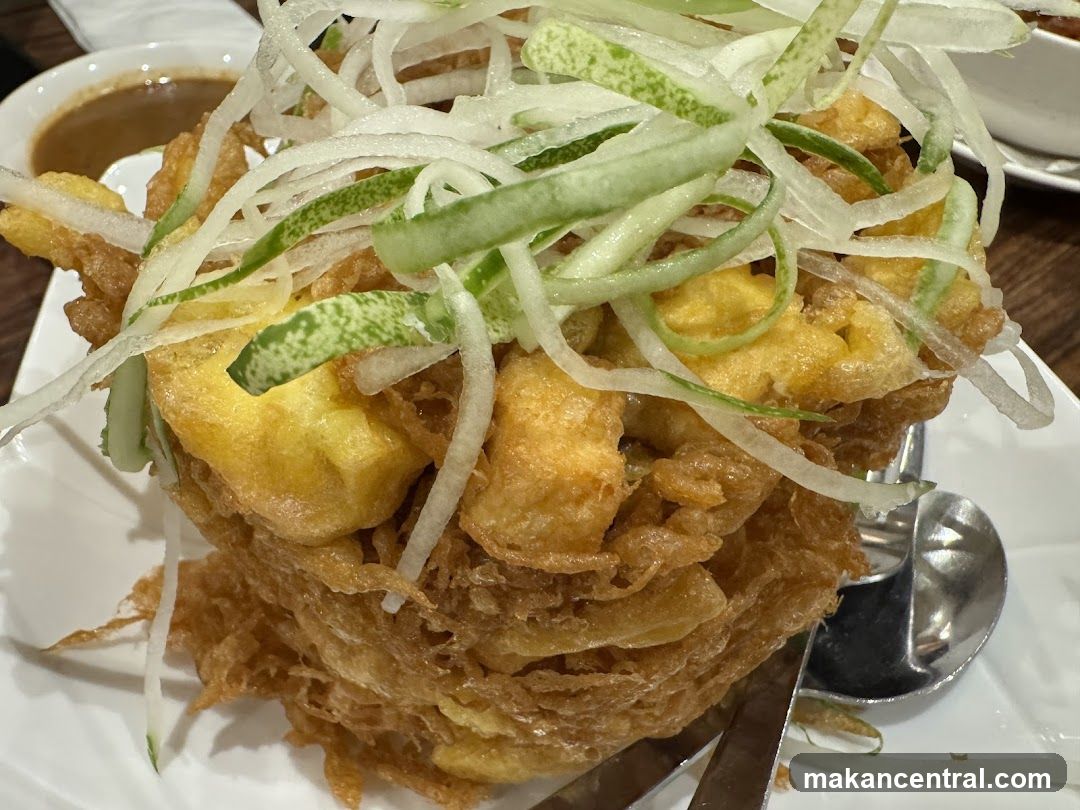 Fried Egg Dish with Cucumber and Onion