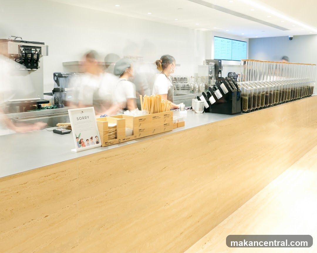 Tea shop counter with staff and ingredients