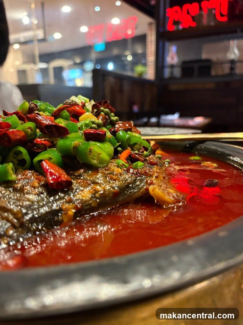 Spicy Fish Dish in Restaurant Interior