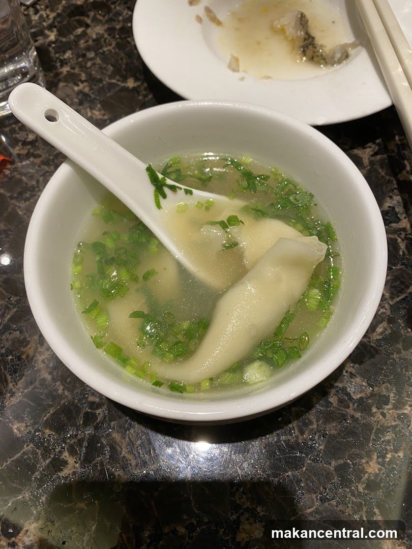 Dumpling Soup in White Bowl